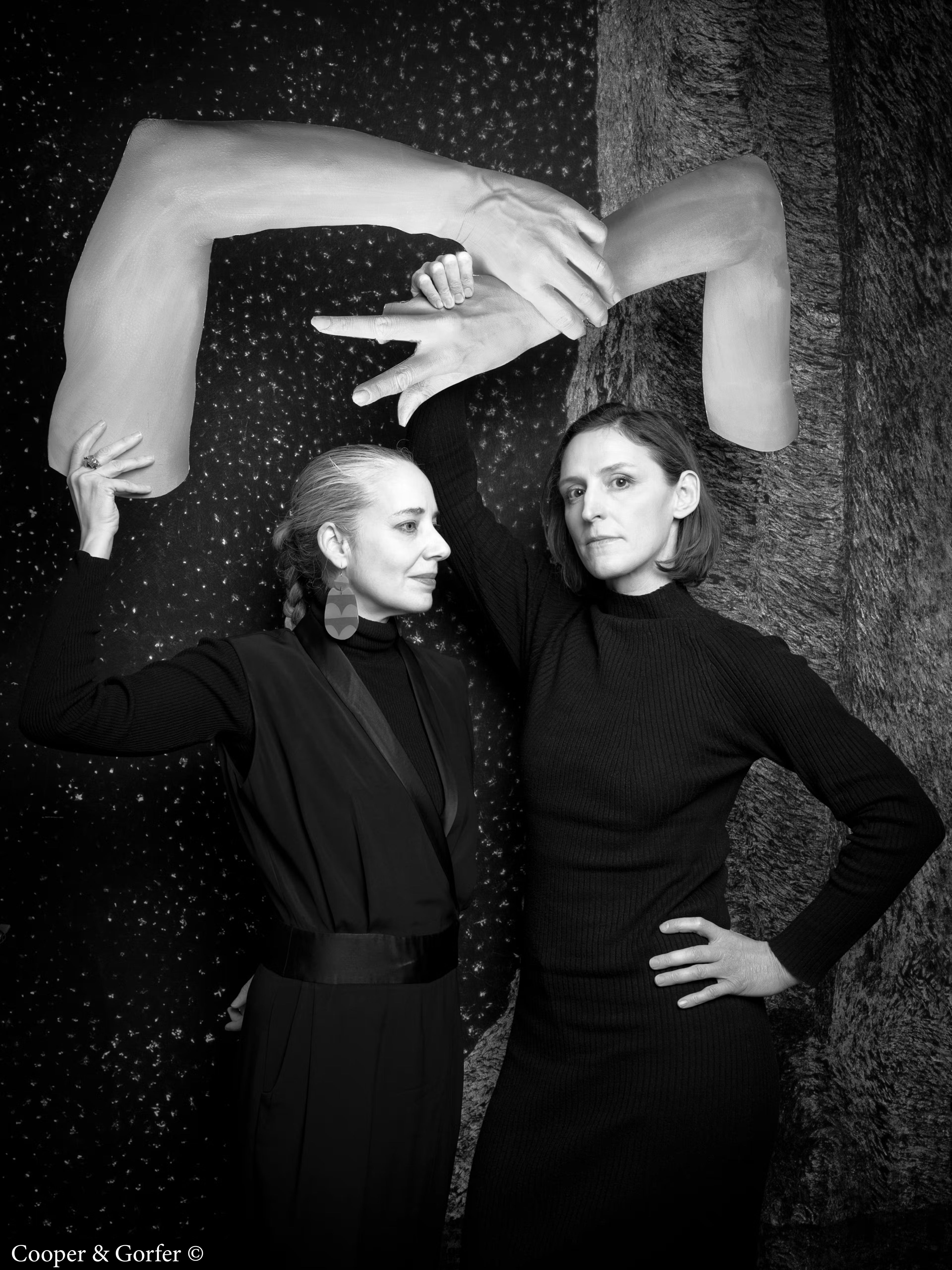Black and white portrait of artist duo Cooper & Gorfer. 
