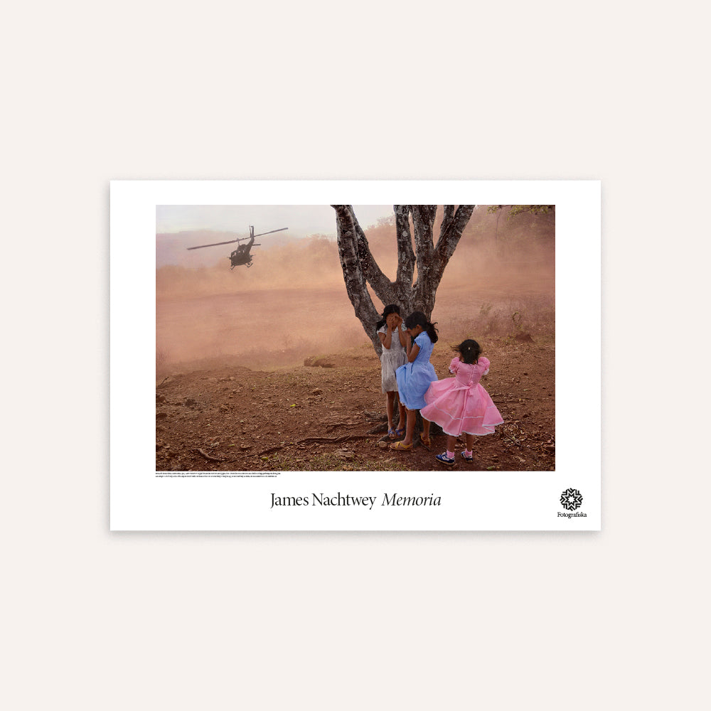 Motif with a tree, children, and helicopter on a misty background, featuring the artist 'James Nachtwey'.
