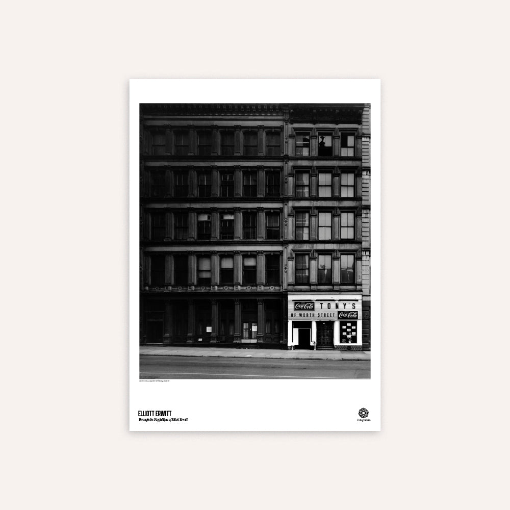 Poster of a black and white photograph of an urban building facade with a store front. 