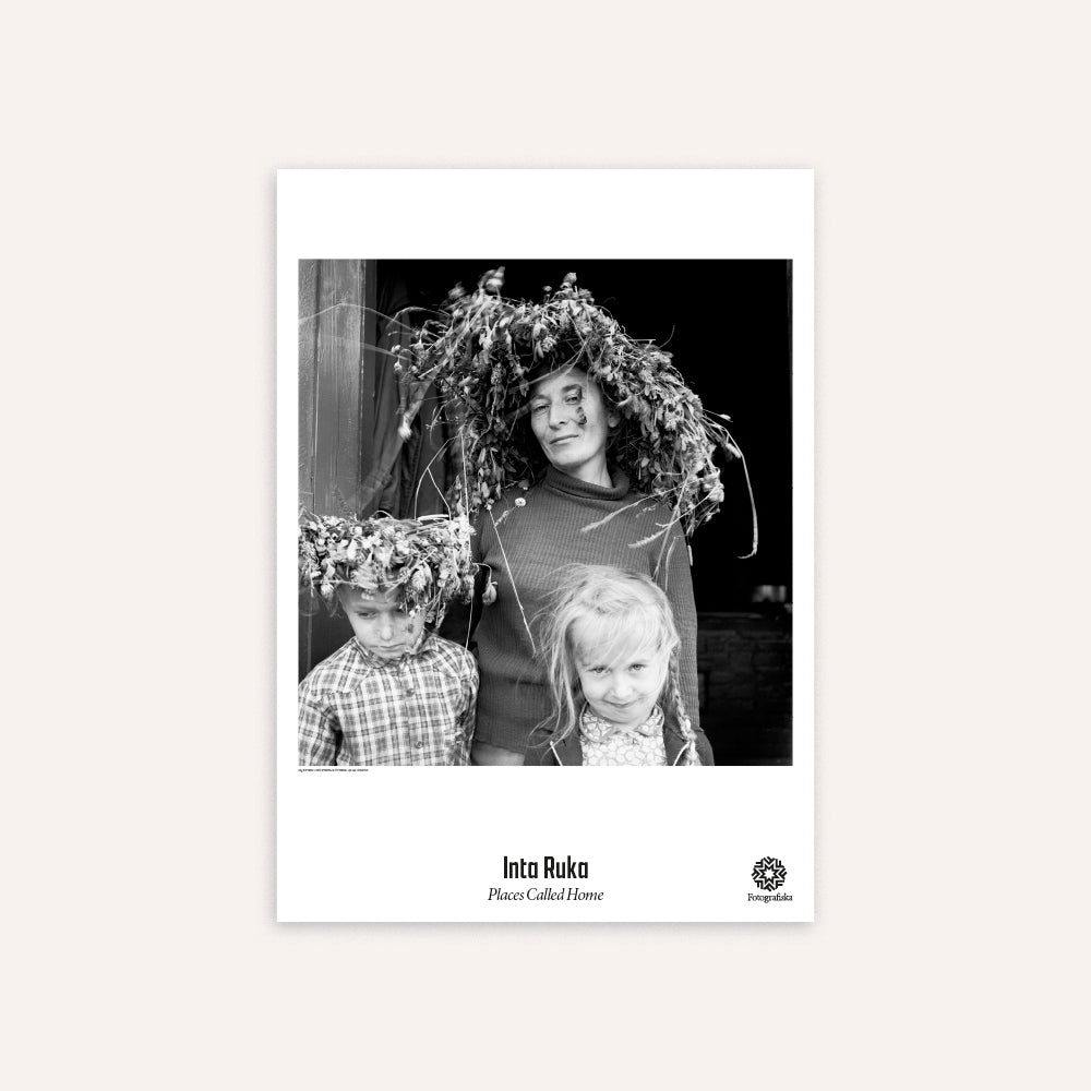 Poster with black and white photo of three children wearing floral crowns, by Inta Ruka. 