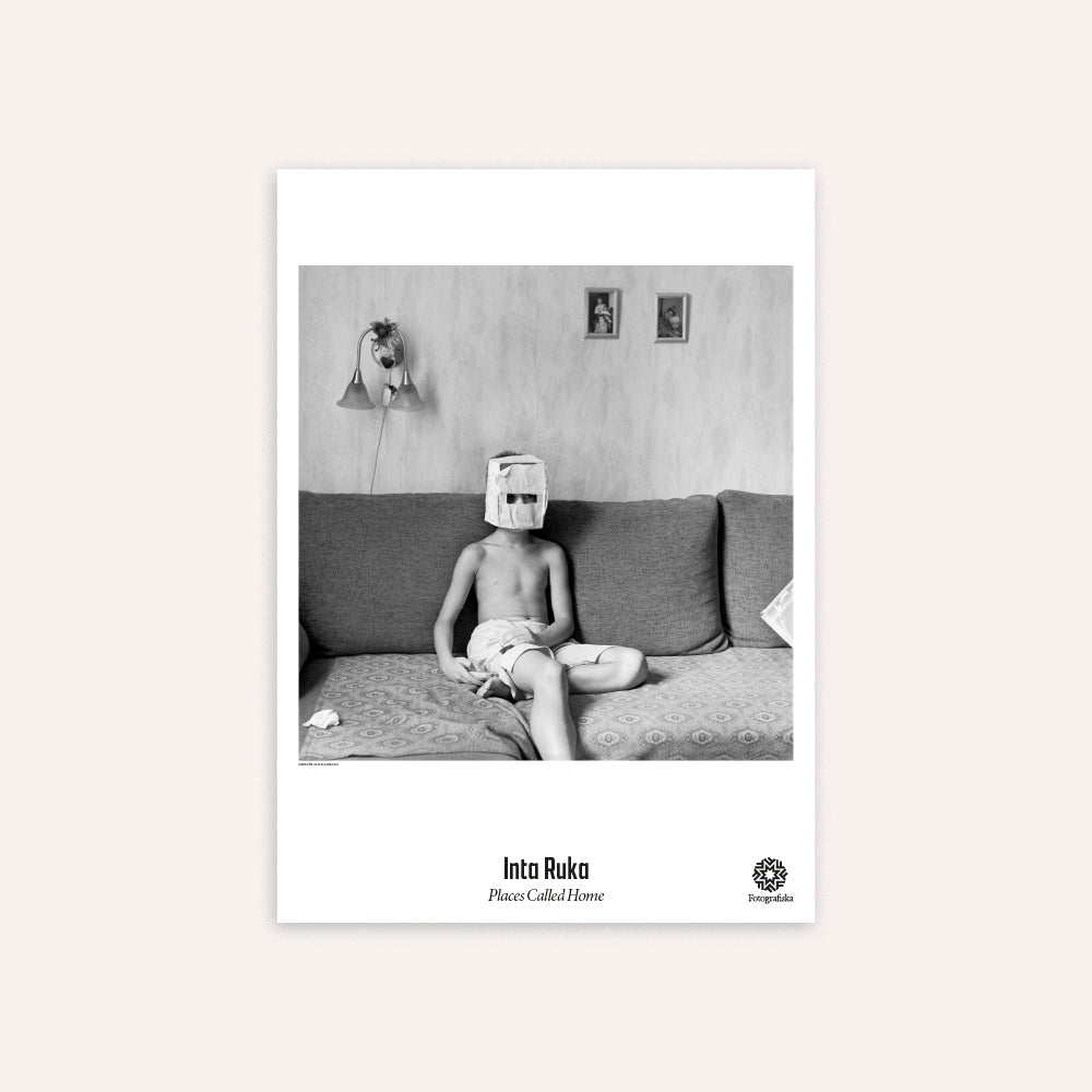 Black and white poster of a person sitting on a couch by Inta Ruka. 