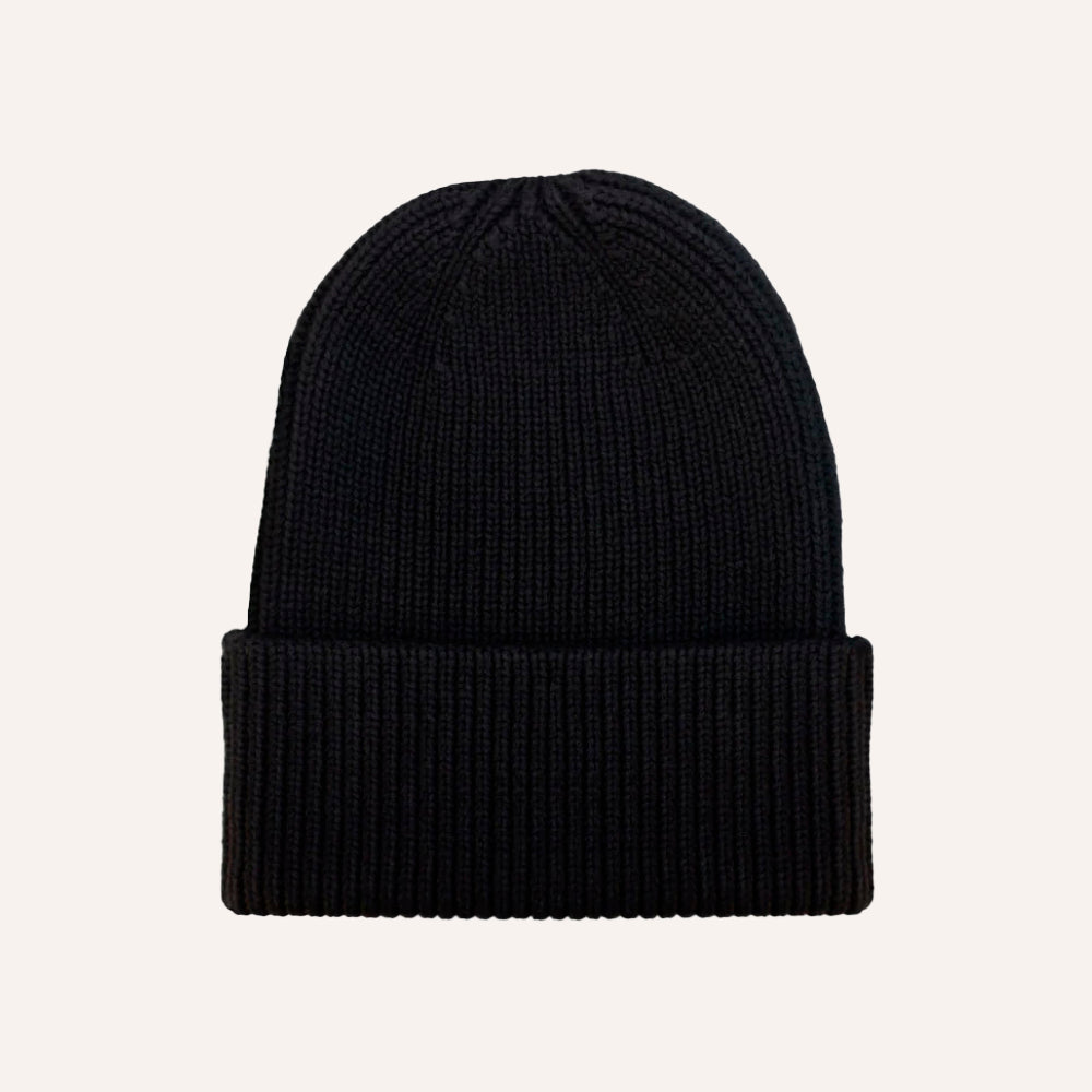 Black knit beanie on a light gray background