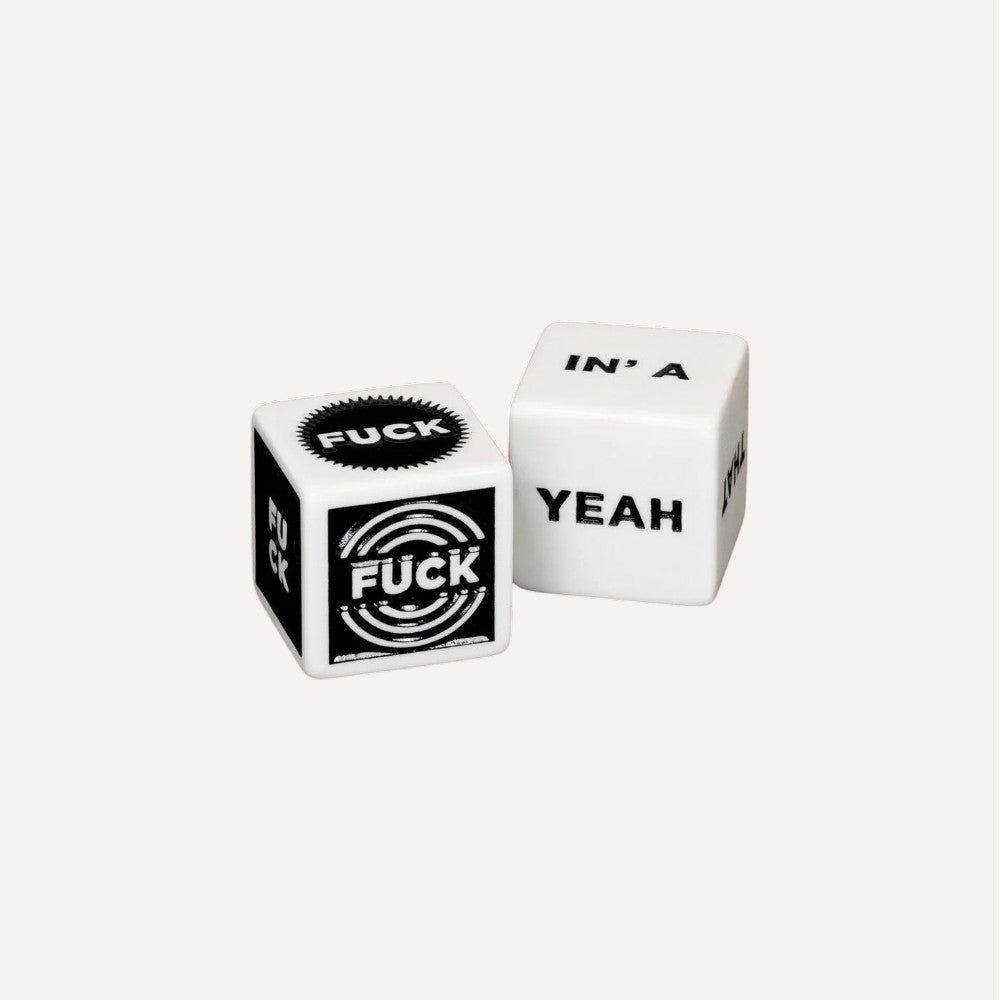 Two dice with black text on a grey background