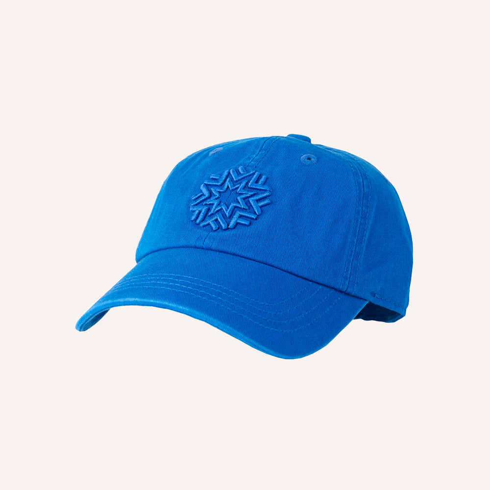 Blue kids baseball cap with a logo on a light gray background