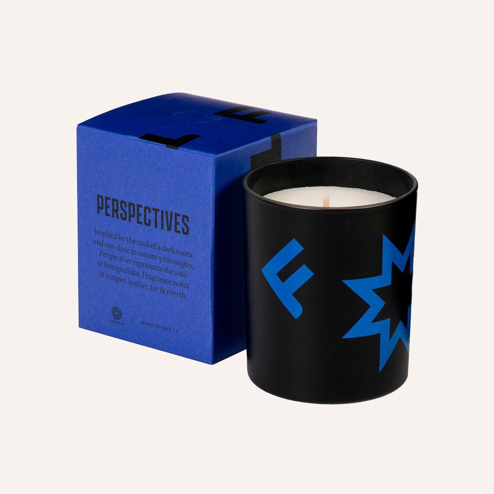 Black candle with blue logo next to a blue box labeled 'Perspectives' on a white background