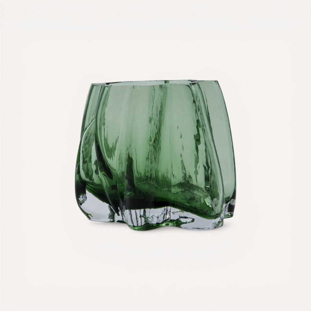 Green glass candle holder. 