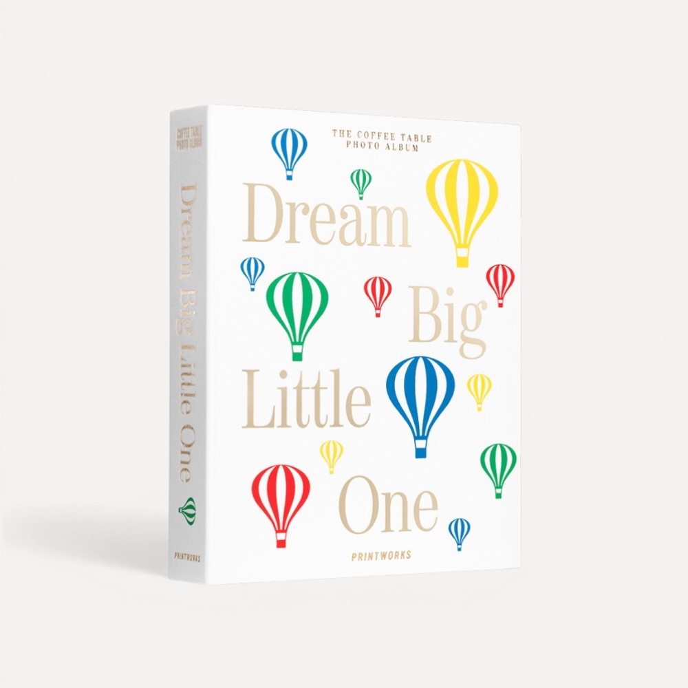 Photo album with colorful hot air balloons and text on a white background