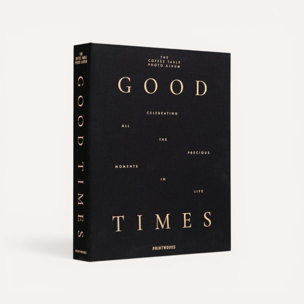 Black photo album with gold text 'Good Times'. 