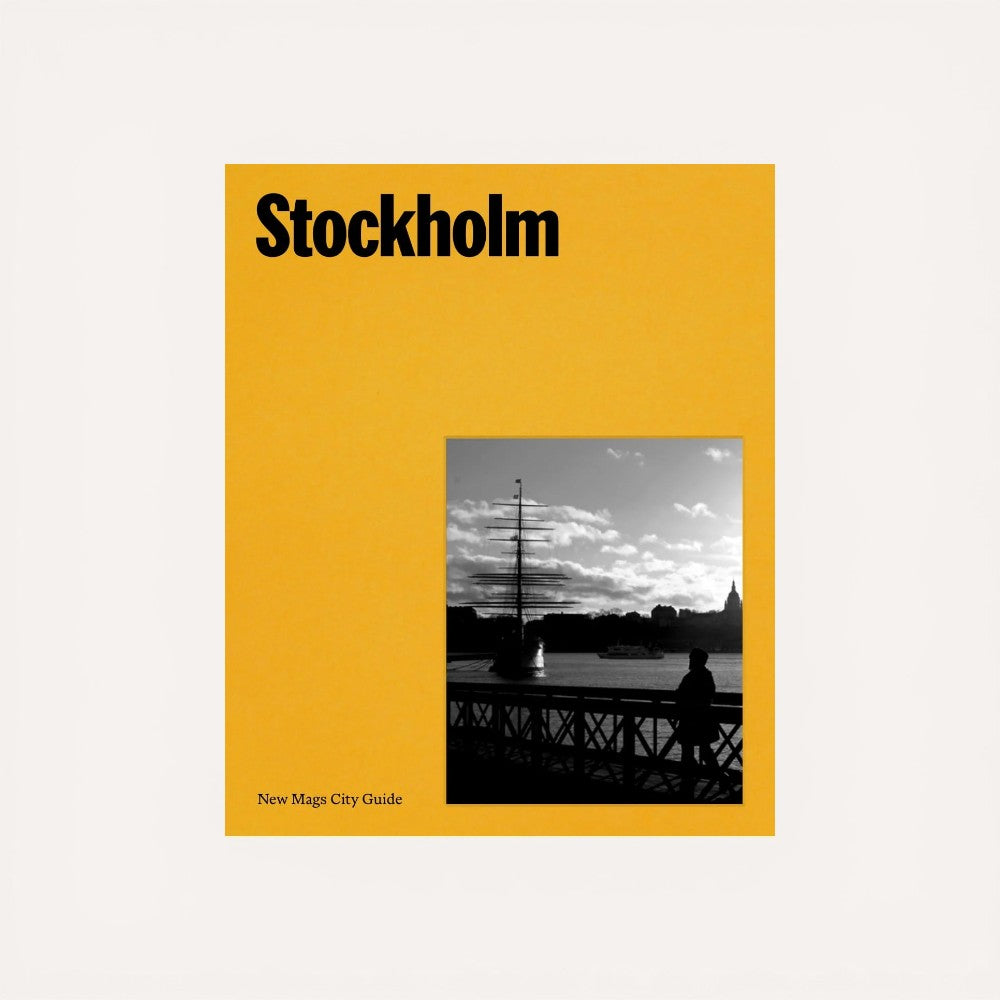 Book cover of 'Stockholm' by New Mags City Guide with a yellow background and black and white photo.
