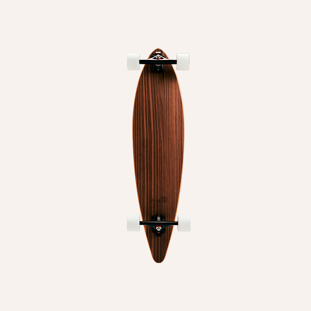 Wooden skateboard with a white truck on a light gray background