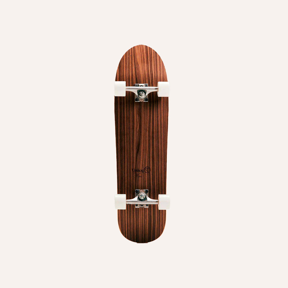 Wooden skateboard deck with a visible brand logo on a white background
