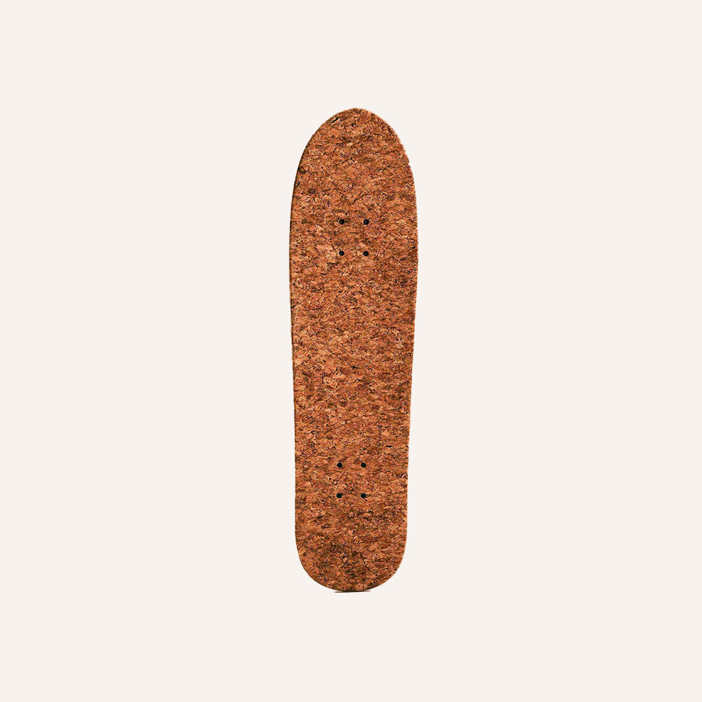 Cork skateboard deck on a white background