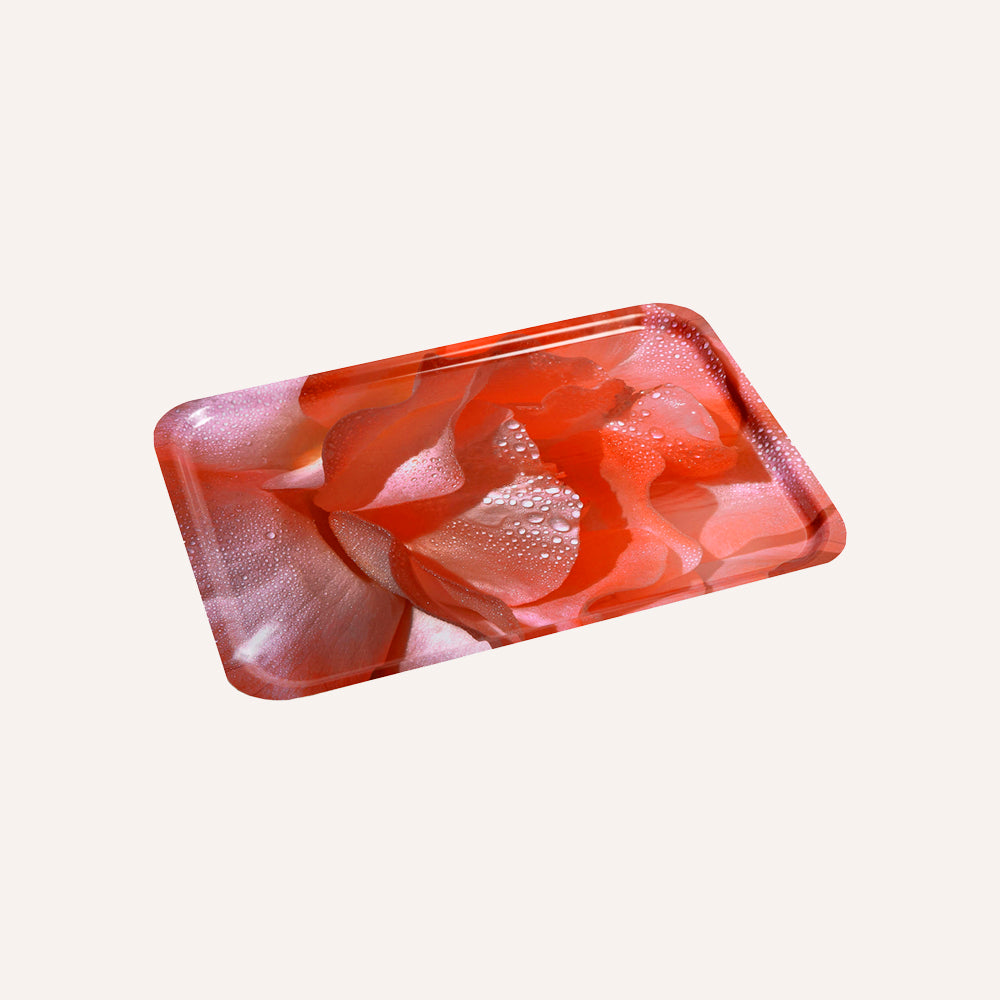 Tray with red and white floral pattern on a light gray background