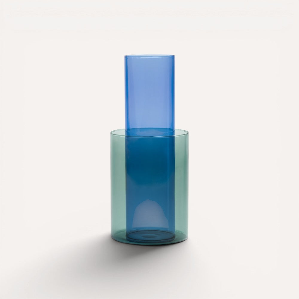 Blue and green glass vase shaped as a cylinder. 