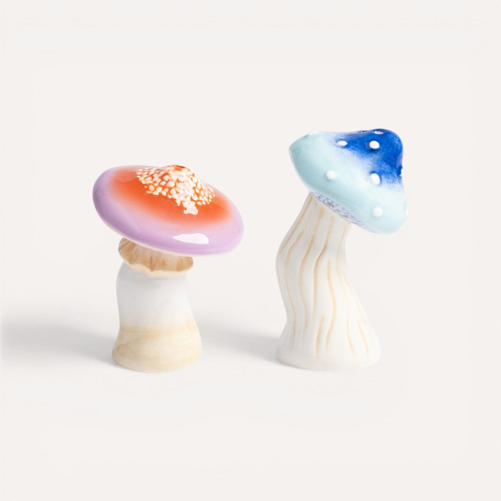Two colorful mushroom-shaped salt and pepper shakers by &klevering. 